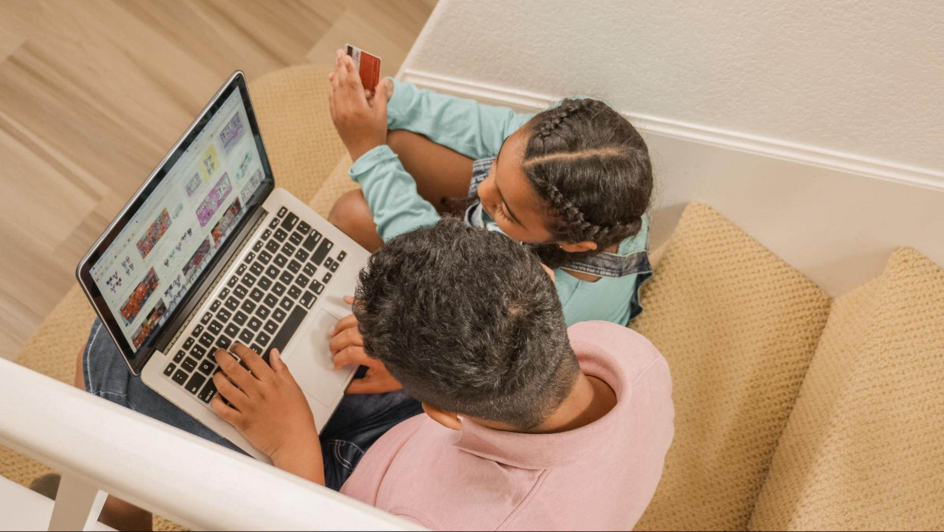 Parent and child with macbook